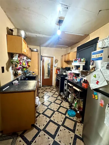 a room with furniture and a flat screen tv