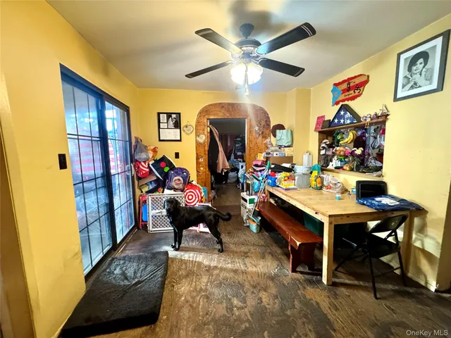 a view of a workspace with furniture and a livingroom
