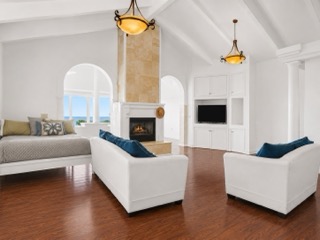 2107 Kaiwiki Road Hilo, HI 96720 - Photo 17 of 30 a living room with furniture and a fireplace