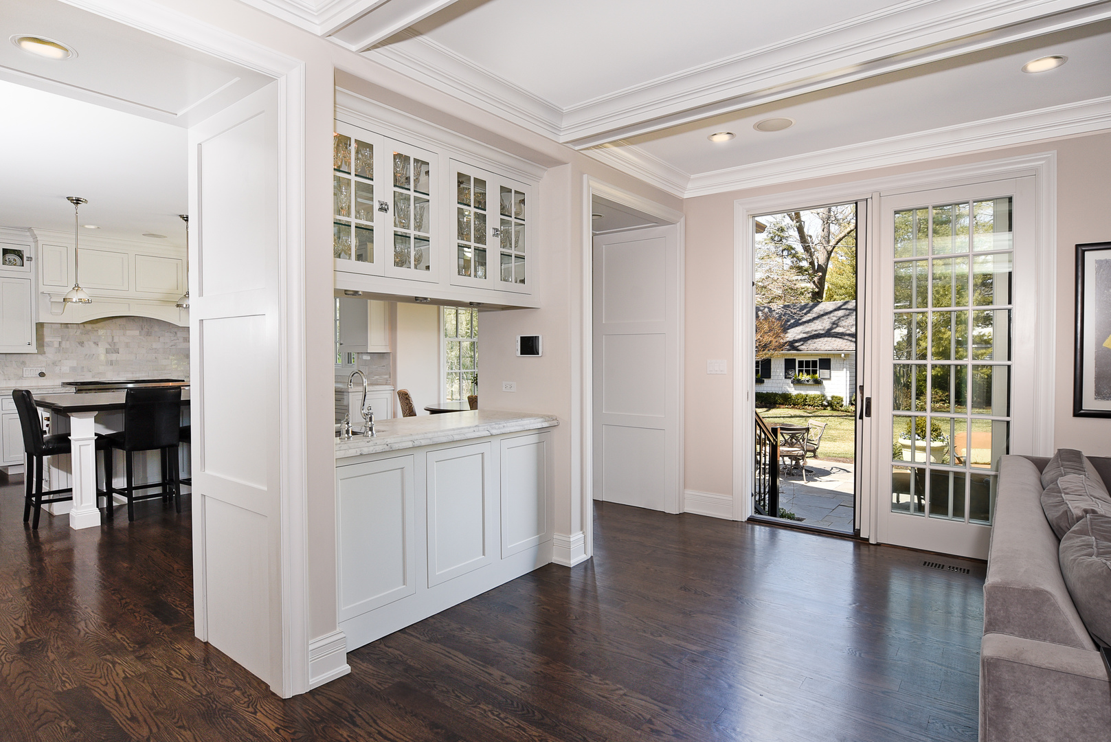 373 Elder Lane Winnetka, IL 60093 - Photo 11 of 53 a hallway with wooden floor and windows