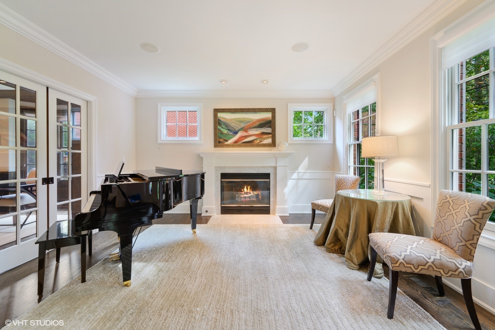 373 Elder Lane Winnetka, IL 60093 - Photo 15 of 53 a living room with furniture and a fireplace