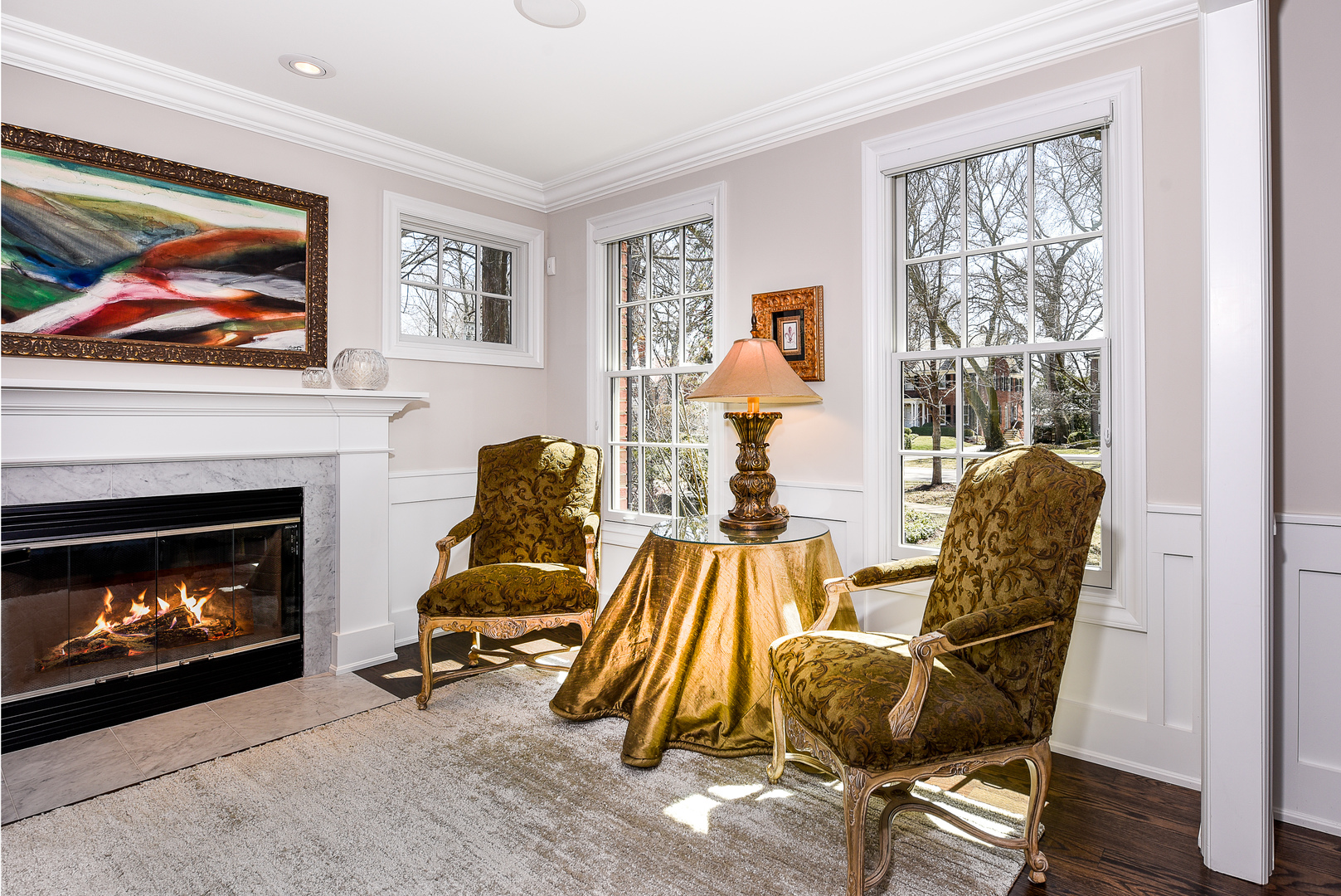 373 Elder Lane Winnetka, IL 60093 - Photo 16 of 53 a living room with furniture and a fireplace