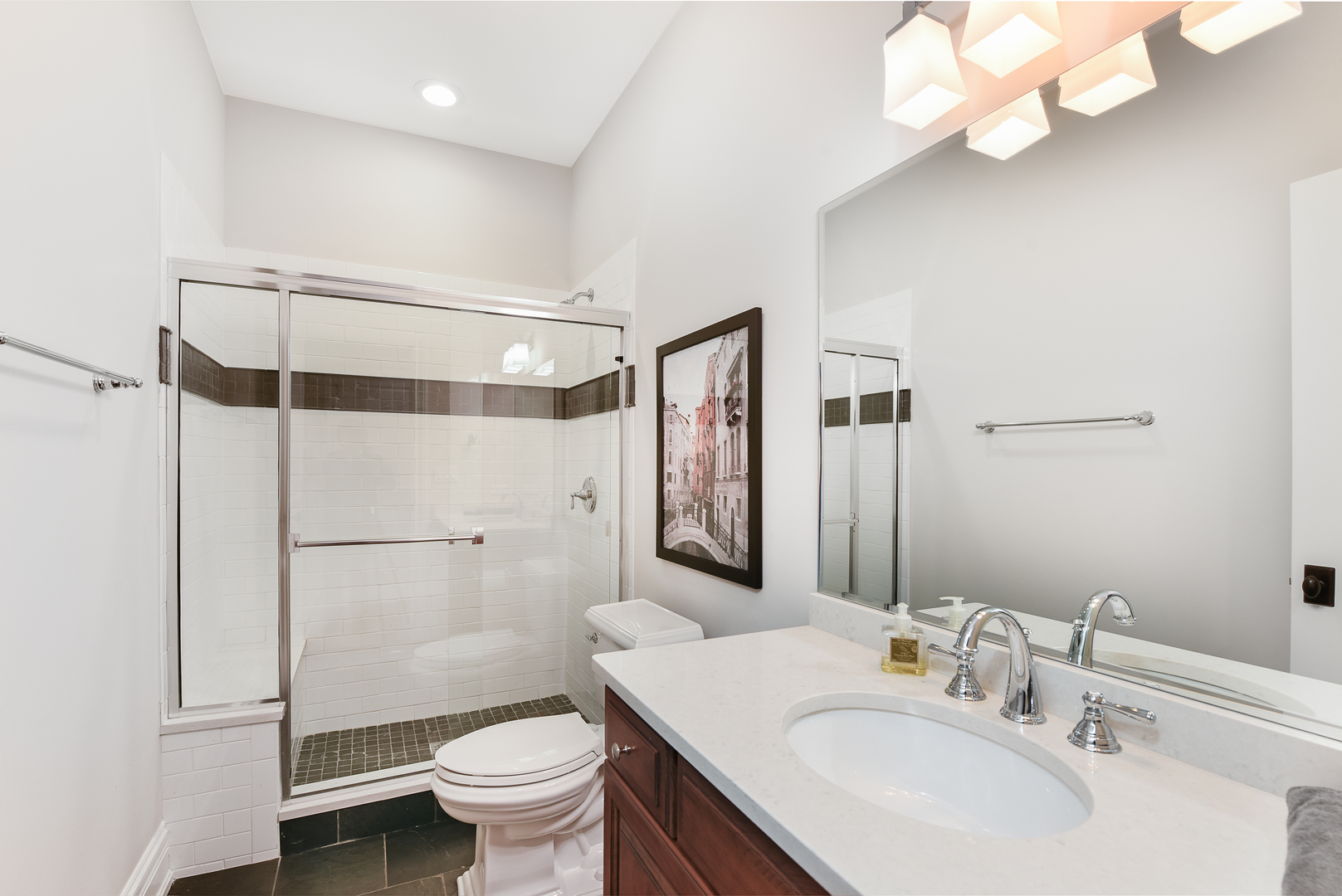 373 Elder Lane Winnetka, IL 60093 - Photo 25 of 53 a bathroom with a sink toilet and shower