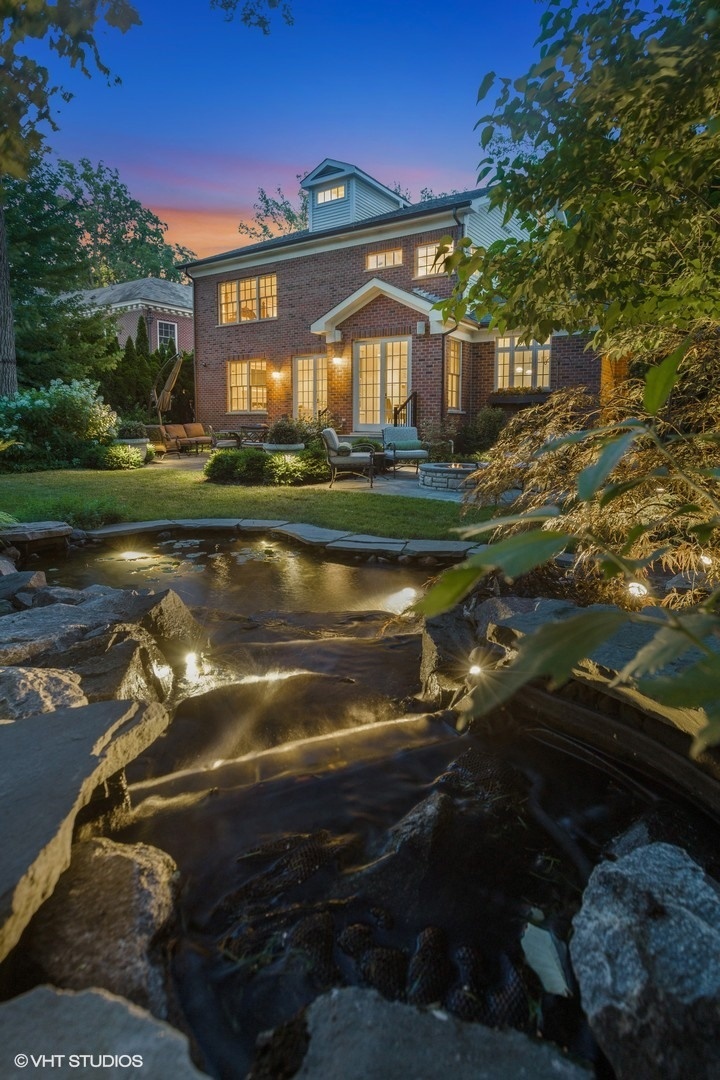 373 Elder Lane Winnetka, IL 60093 - Photo 43 of 53 a view of a house with a yard