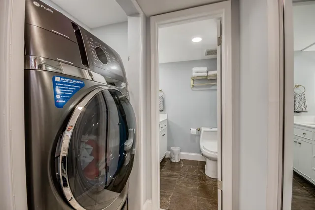a bathroom with a toilet and a sink