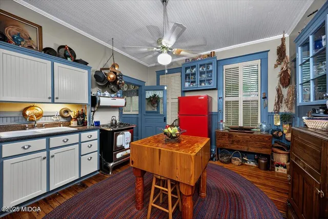 a room with furniture and wooden floor