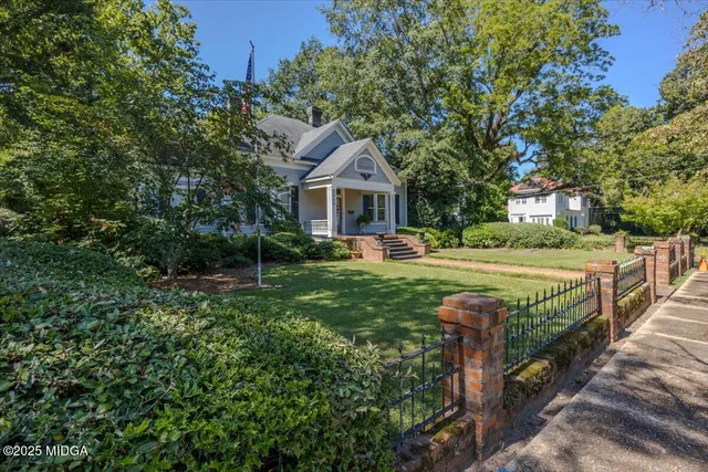 a house view with a garden space