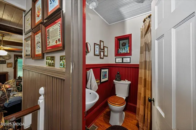 a view of an entryway with wooden floor