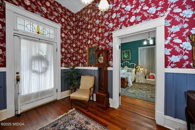 a view of a couches and dinning table in patio