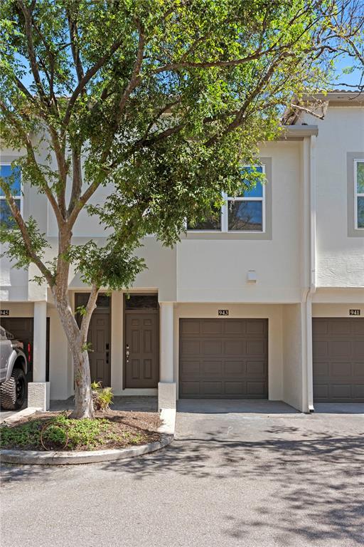 a house with trees in front of it