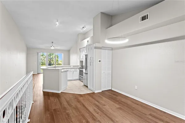a view of kitchen with wooden floor