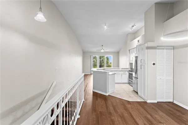 a view of kitchen with wooden floor