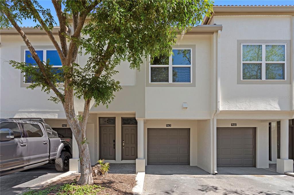 943 Normandy Trace Road Tampa, FL 33602 - Photo 31 of 51 a front view of a house with a yard