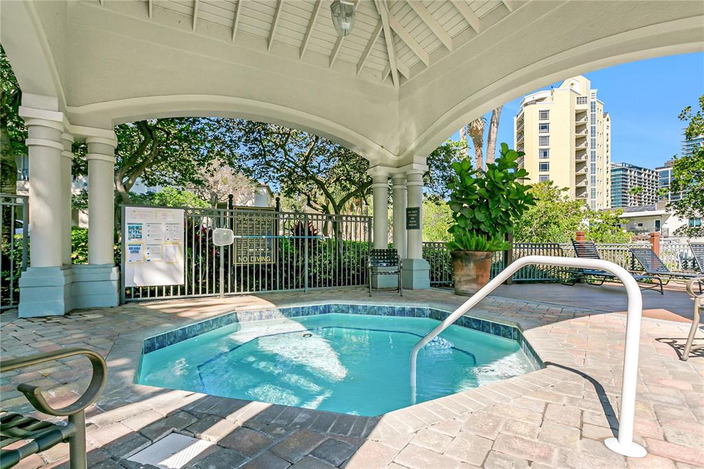 943 Normandy Trace Road Tampa, FL 33602 - Photo 34 of 51 a view of a swimming pool with a patio
