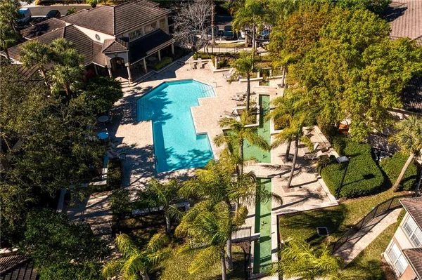 a view of outdoor space with playground and green space