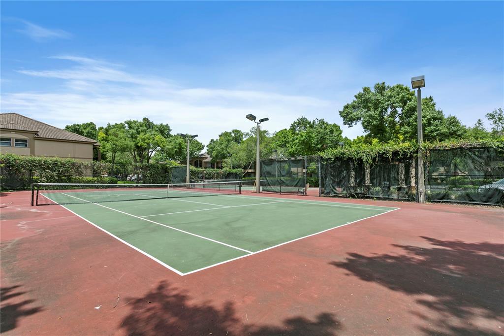 943 Normandy Trace Road Tampa, FL 33602 - Photo 39 of 51 a view of a tennis court