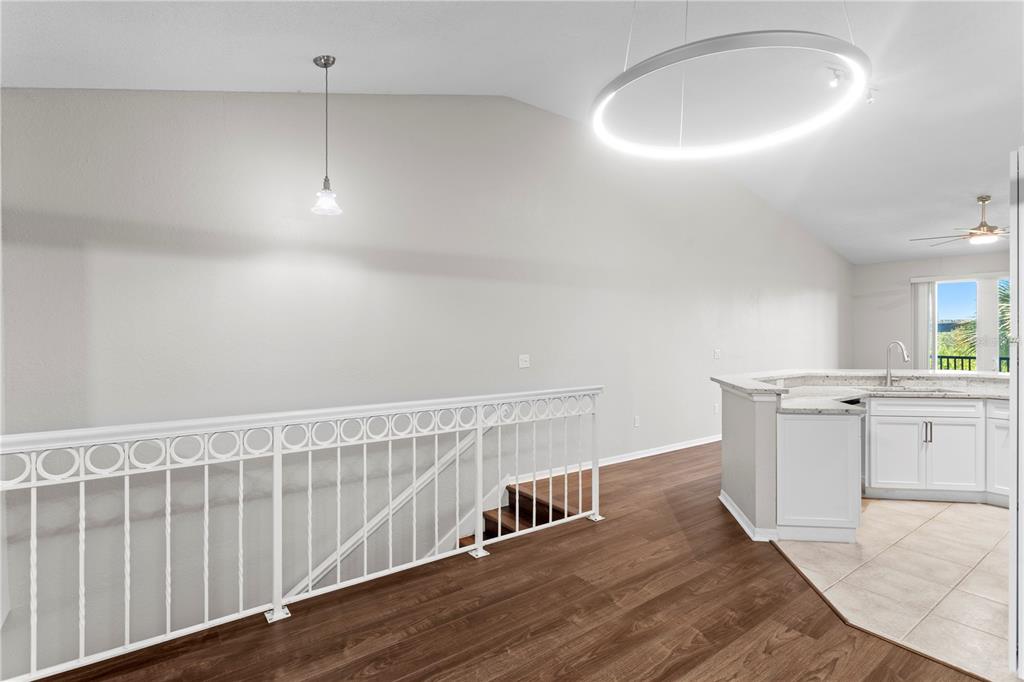 943 Normandy Trace Road Tampa, FL 33602 - Photo 4 of 51 a view of kitchen with wooden floor