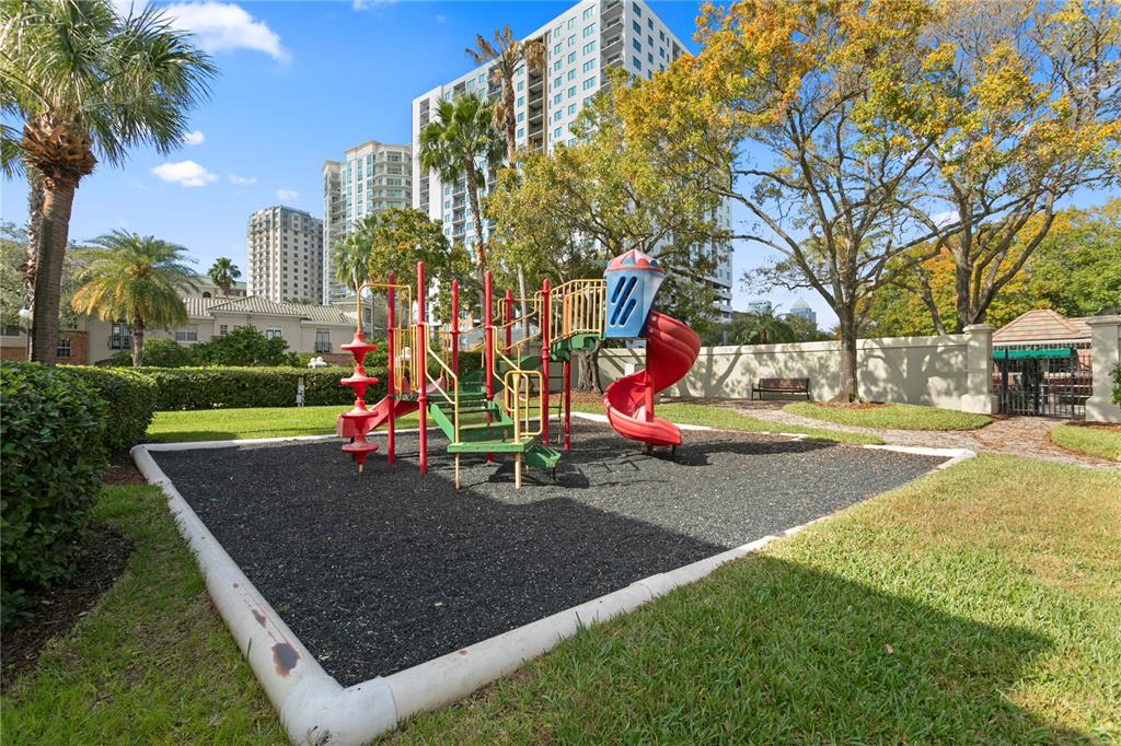 943 Normandy Trace Road Tampa, FL 33602 - Photo 41 of 51 a view of outdoor space with playground and green space