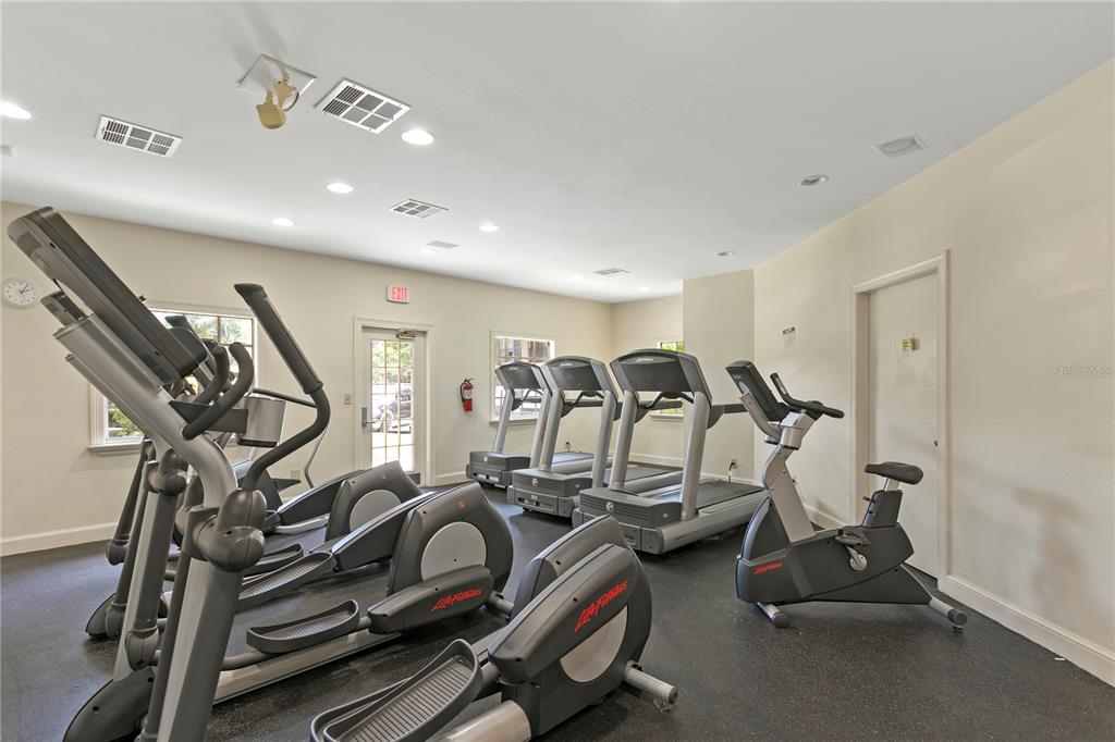 943 Normandy Trace Road Tampa, FL 33602 - Photo 43 of 51 a view of a room with gym equipment
