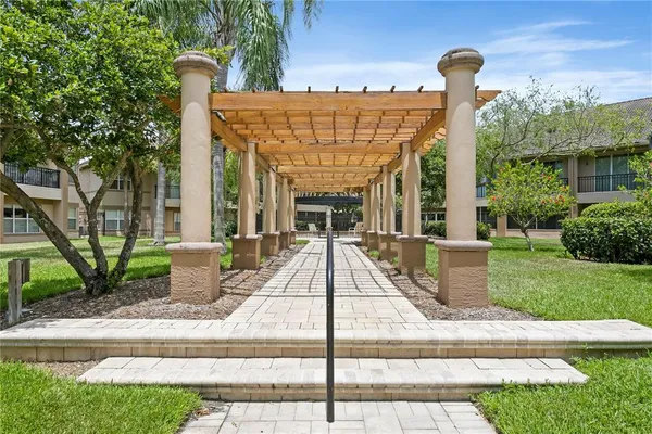 a view of swimming pool with outdoor seating