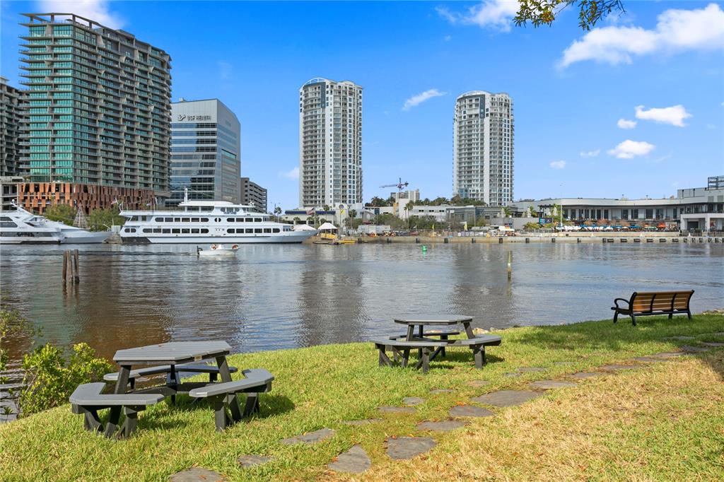 943 Normandy Trace Road Tampa, FL 33602 - Photo 45 of 51 a view of a lake with tall building in the background