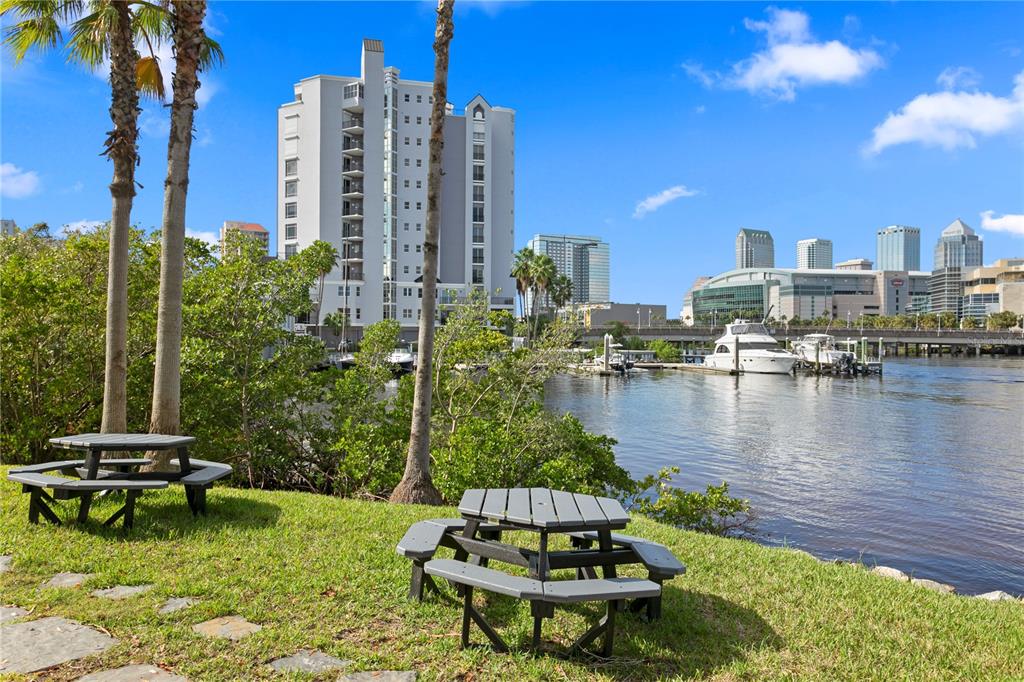 943 Normandy Trace Road Tampa, FL 33602 - Photo 46 of 51 a lake with tall building in the background