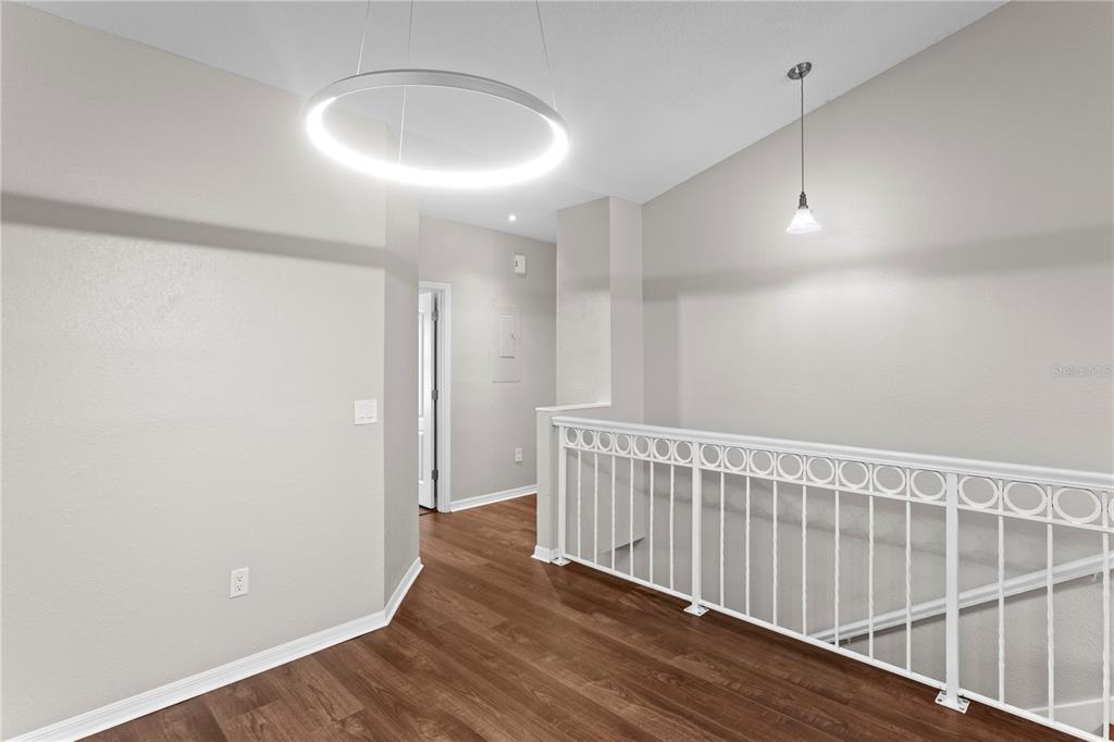 943 Normandy Trace Road Tampa, FL 33602 - Photo 5 of 51 a view of entryway with wooden floor