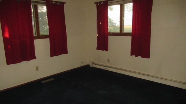2202 Cr E 2400 Rd Street North St. Joseph, IL 61873 - Photo 6 of 11 a view of an empty room and window