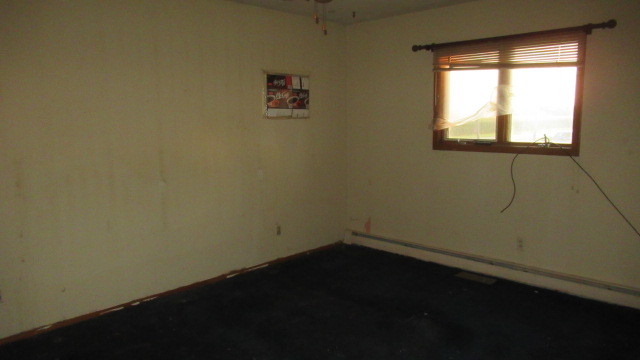 2202 Cr E 2400 Rd Street North St. Joseph, IL 61873 - Photo 7 of 11 a view of a small space with wooden floor and a window