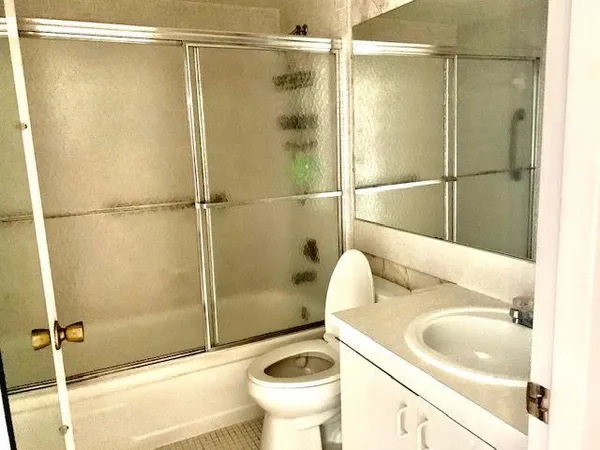 a view of a lake with a yard