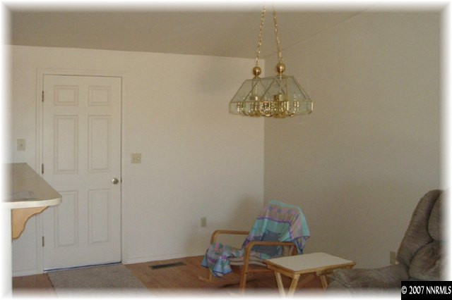 528 Yellow Jacket Road Dayton, NV 89403 - Photo 5 of 9 a room with a table and chairs