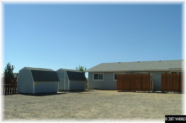528 Yellow Jacket Road Dayton, NV 89403 - Photo 7 of 9 a view of an house with backyard space