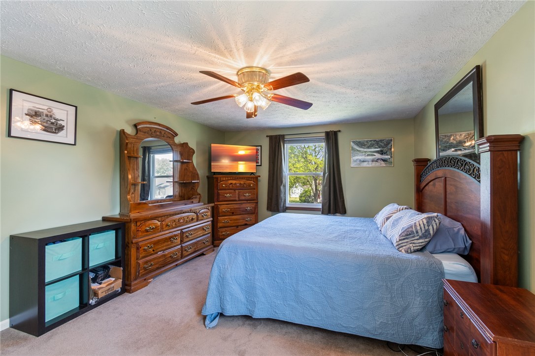 25 Spring Tree Lane Greece, NY 14612 - Photo 22 of 40 Primary bedroom with its own full bath