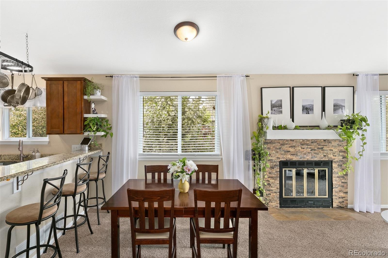 4139 East 131st Drive Thornton, CO 80241 - Photo 11 of 29 a dining room with furniture and window