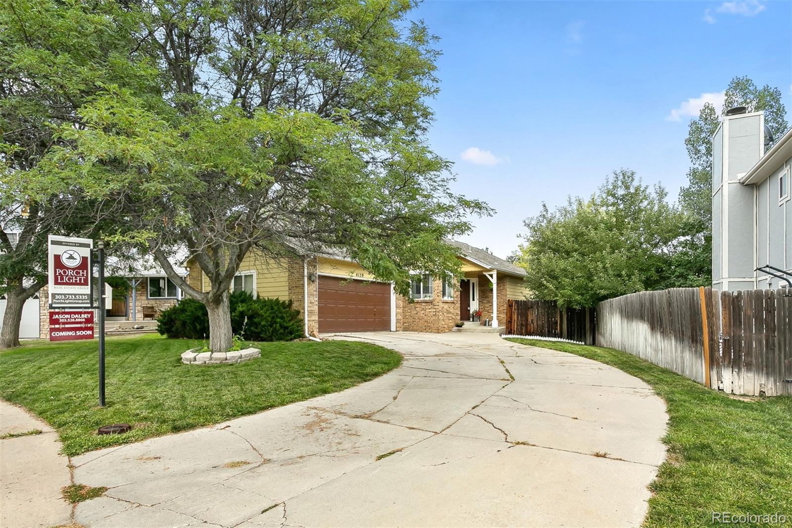 4139 East 131st Drive Thornton, CO 80241 - Photo 2 of 29 a front view of house with yard and green space