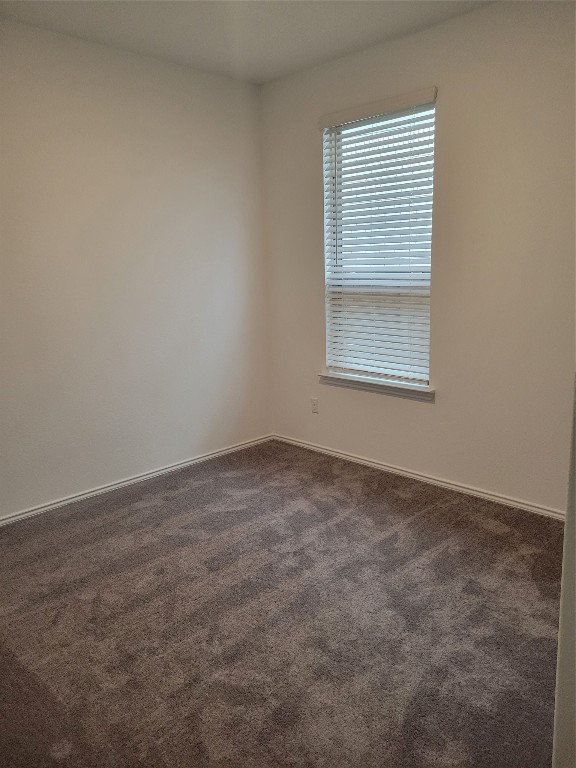 549 Pickrell Loop Georgetown, TX 78628 - Photo 9 of 26 an empty room with a window