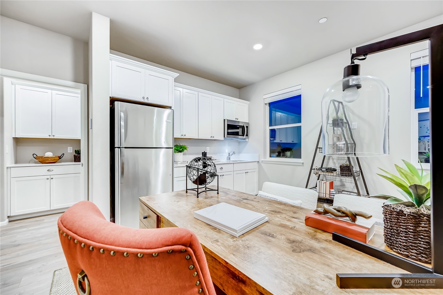4393 Reef Road Southwest, Unit 3047 Port Orchard, WA 98367 - Photo 16 of 27 a living room with furniture and a table