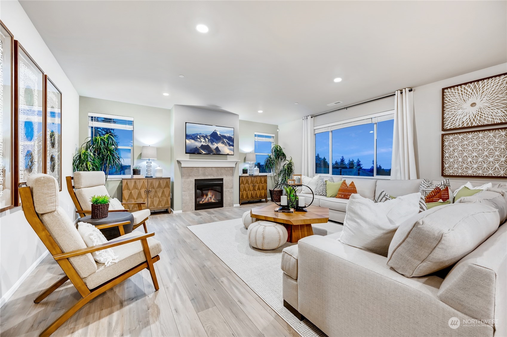 4393 Reef Road Southwest, Unit 3047 Port Orchard, WA 98367 - Photo 18 of 27 a living room with furniture fireplace and a large window