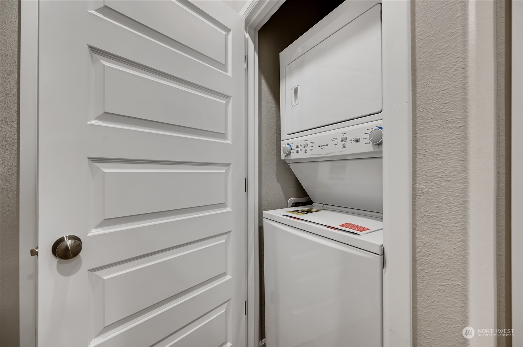 4393 Reef Road Southwest, Unit 3047 Port Orchard, WA 98367 - Photo 21 of 27 a view of storage and utility room with washer and dryer
