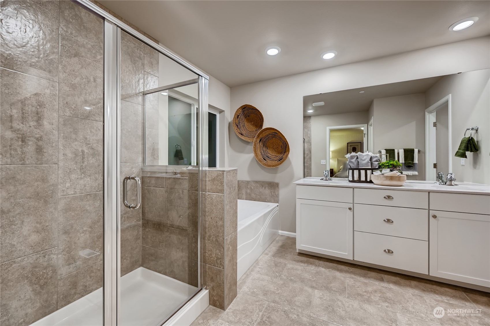 4393 Reef Road Southwest, Unit 3047 Port Orchard, WA 98367 - Photo 23 of 27 a spacious bathroom with a double vanity sink and a mirror