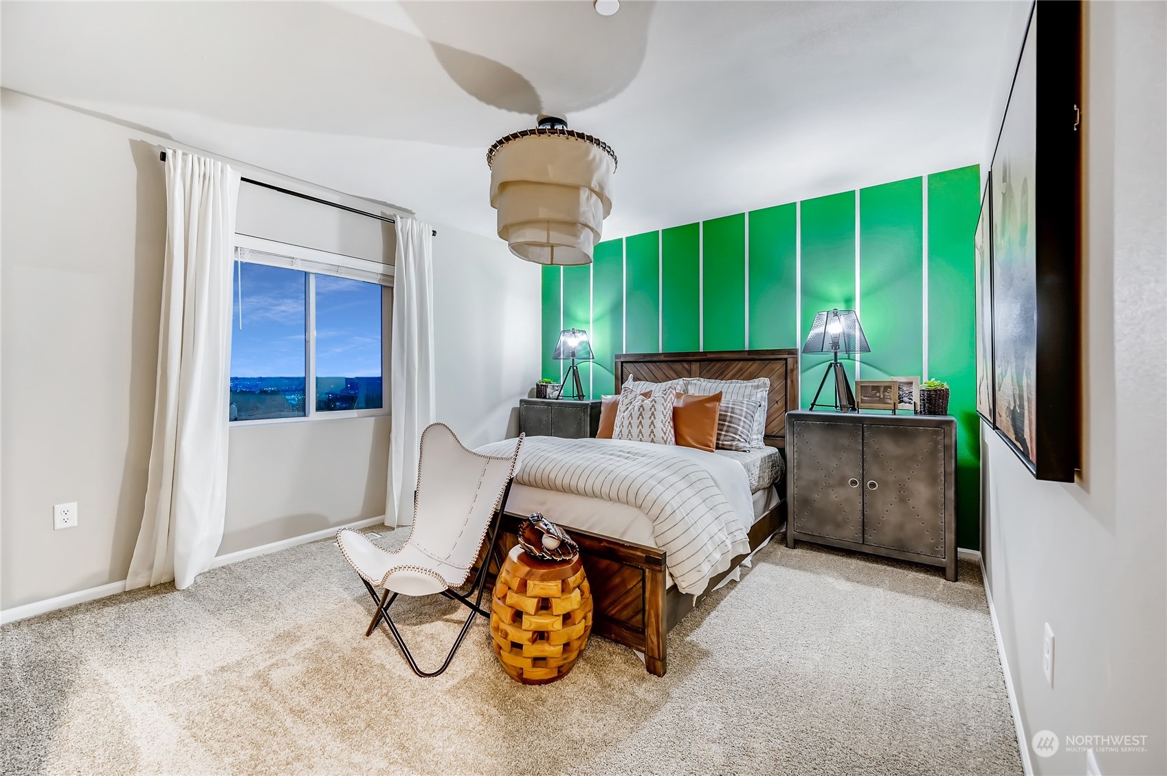 4393 Reef Road Southwest, Unit 3047 Port Orchard, WA 98367 - Photo 4 of 27 a bedroom with furniture and a large window