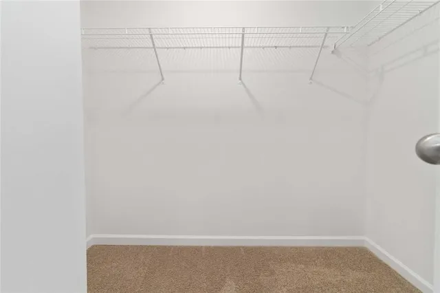 a view of a room with racks on the wall
