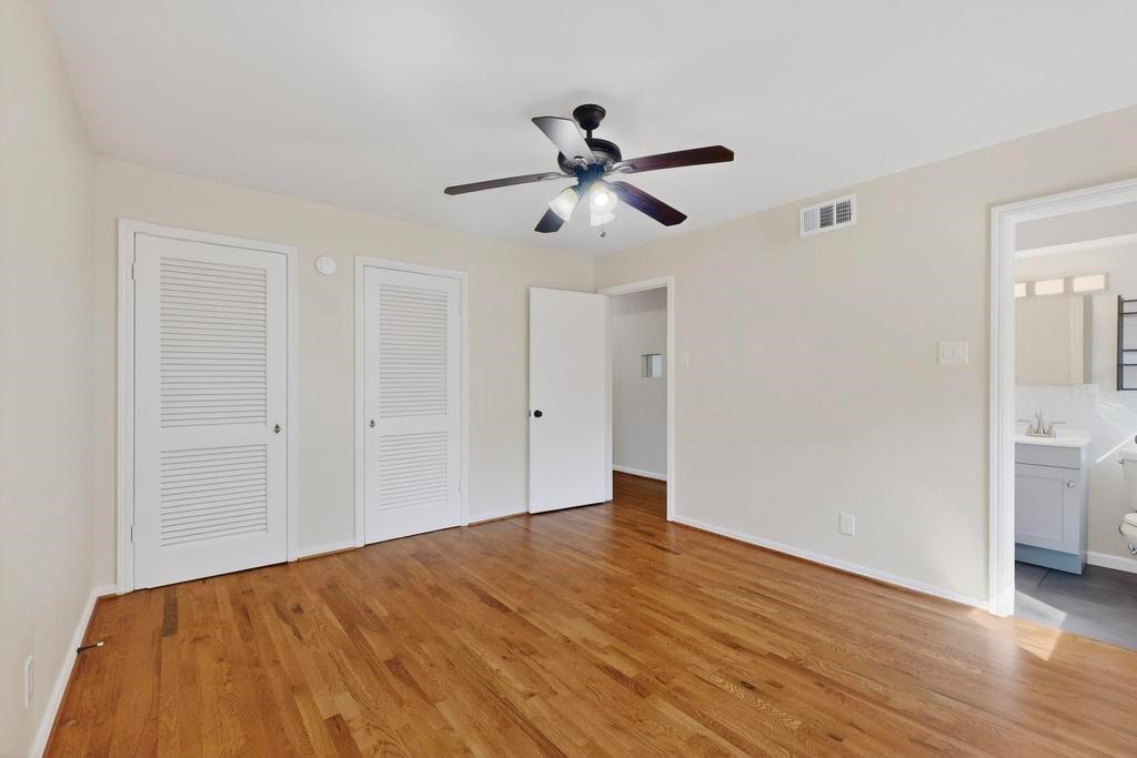 2120 Healey Drive Dallas, TX 75228 - Photo 28 of 39 a view of empty room with wooden floor
