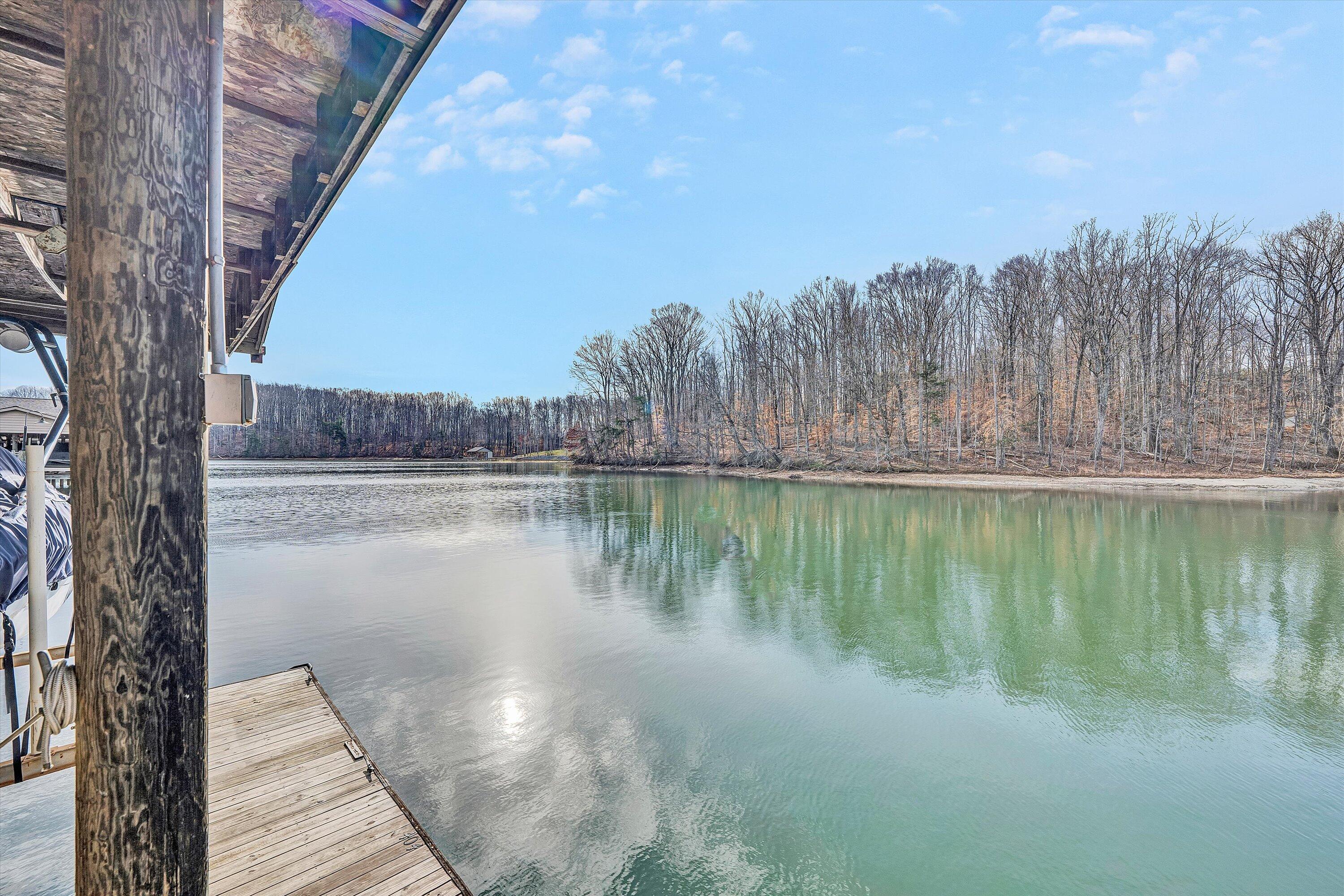 630 Monte Vista Road, Unit 506 Union Hall, VA 24176 - Photo 39 of 50 a view of a lake with a yard