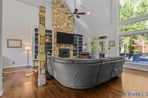 a spacious bedroom with a bed and a couch