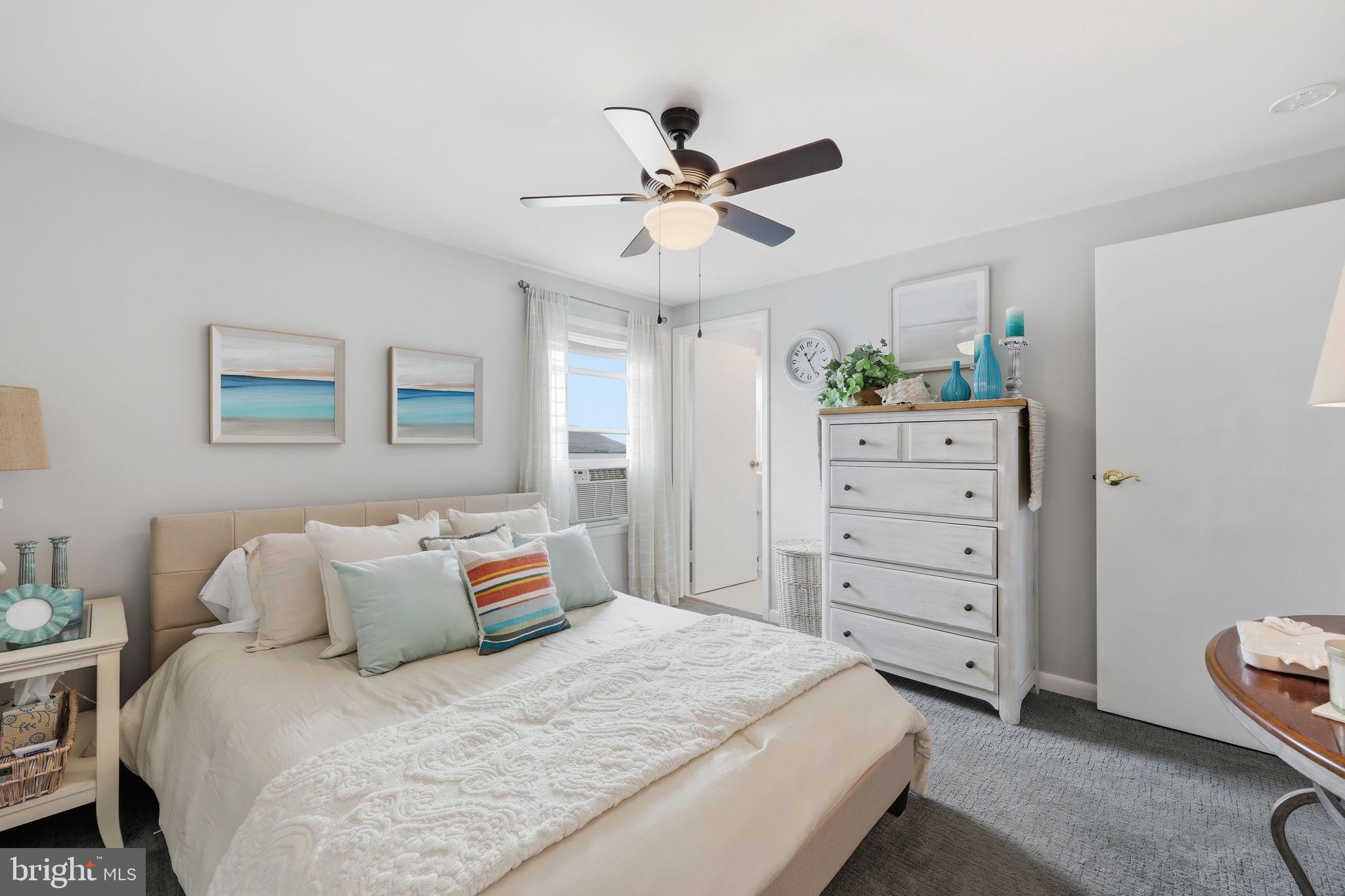 173 Cove Road Newport, NJ 08345 - Photo 23 of 72 a bedroom with a bed and a dresser
