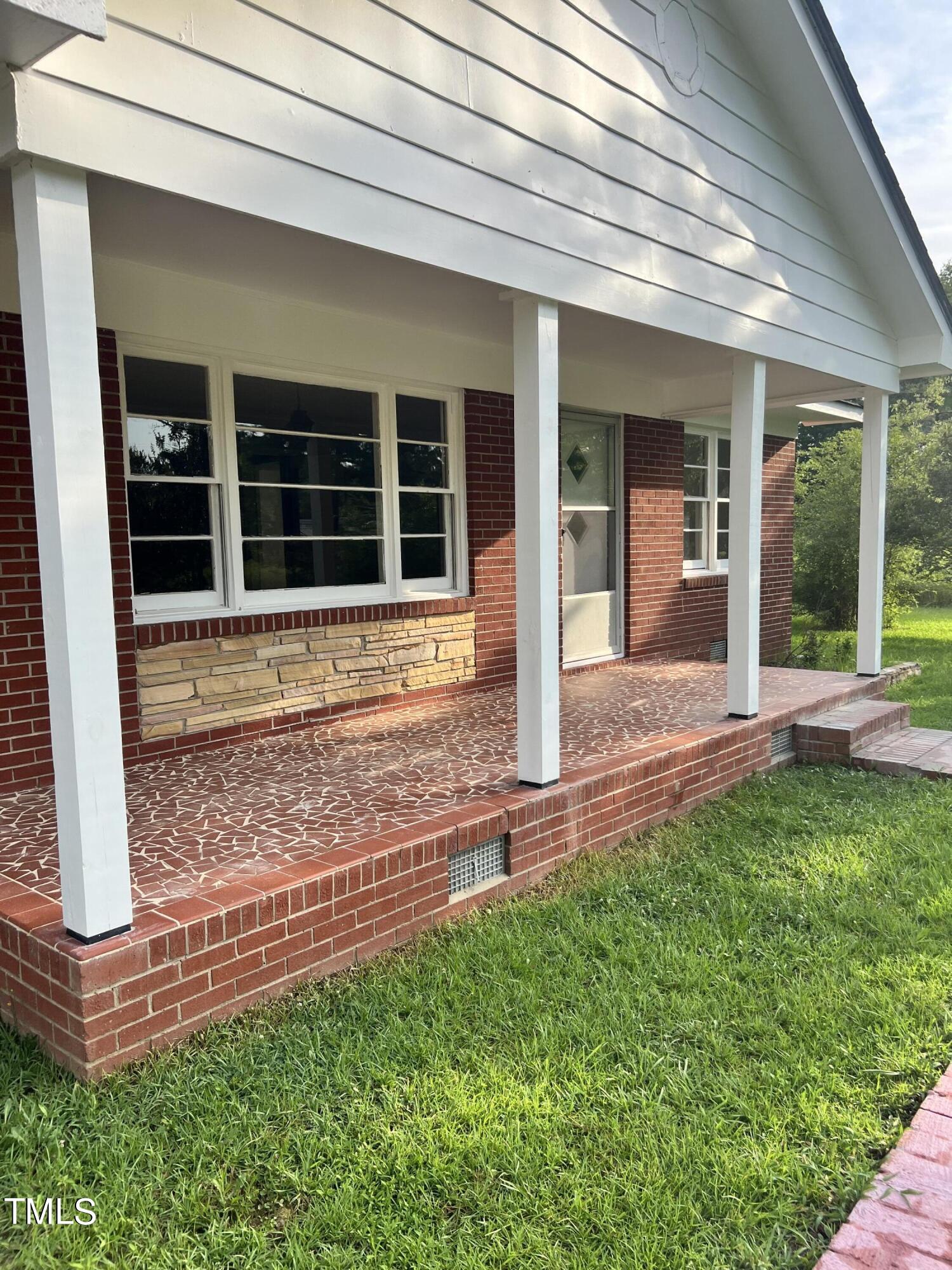 3226 Bunnlevel Erwin Road Erwin, NC 28339 - Photo 2 of 21 front view of a house with a yard