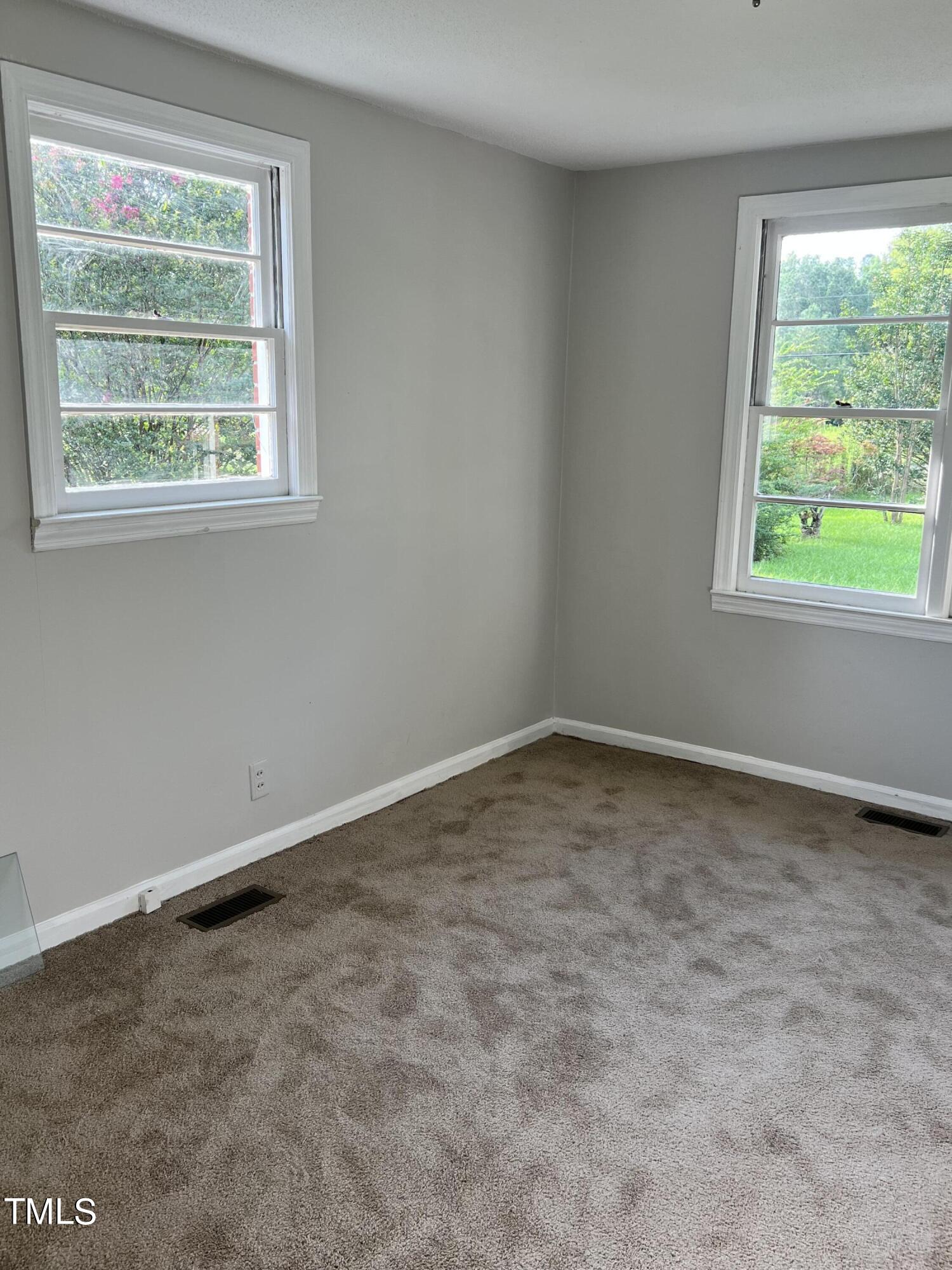 3226 Bunnlevel Erwin Road Erwin, NC 28339 - Photo 10 of 21 an empty room with a window
