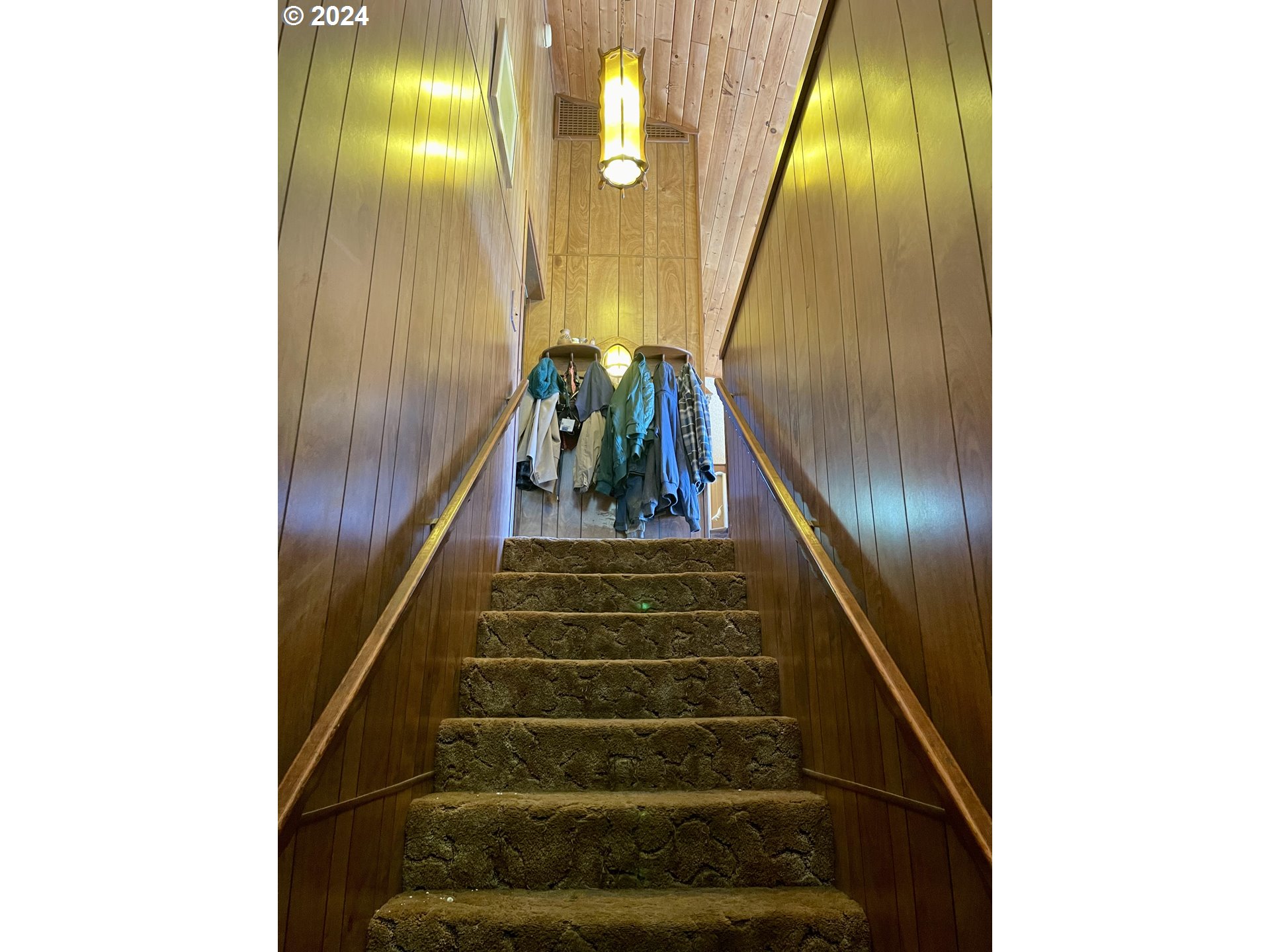 96333 Wildwood Road Brookings, OR 97415 - Photo 7 of 19 a view of staircase with white walls and a mirror