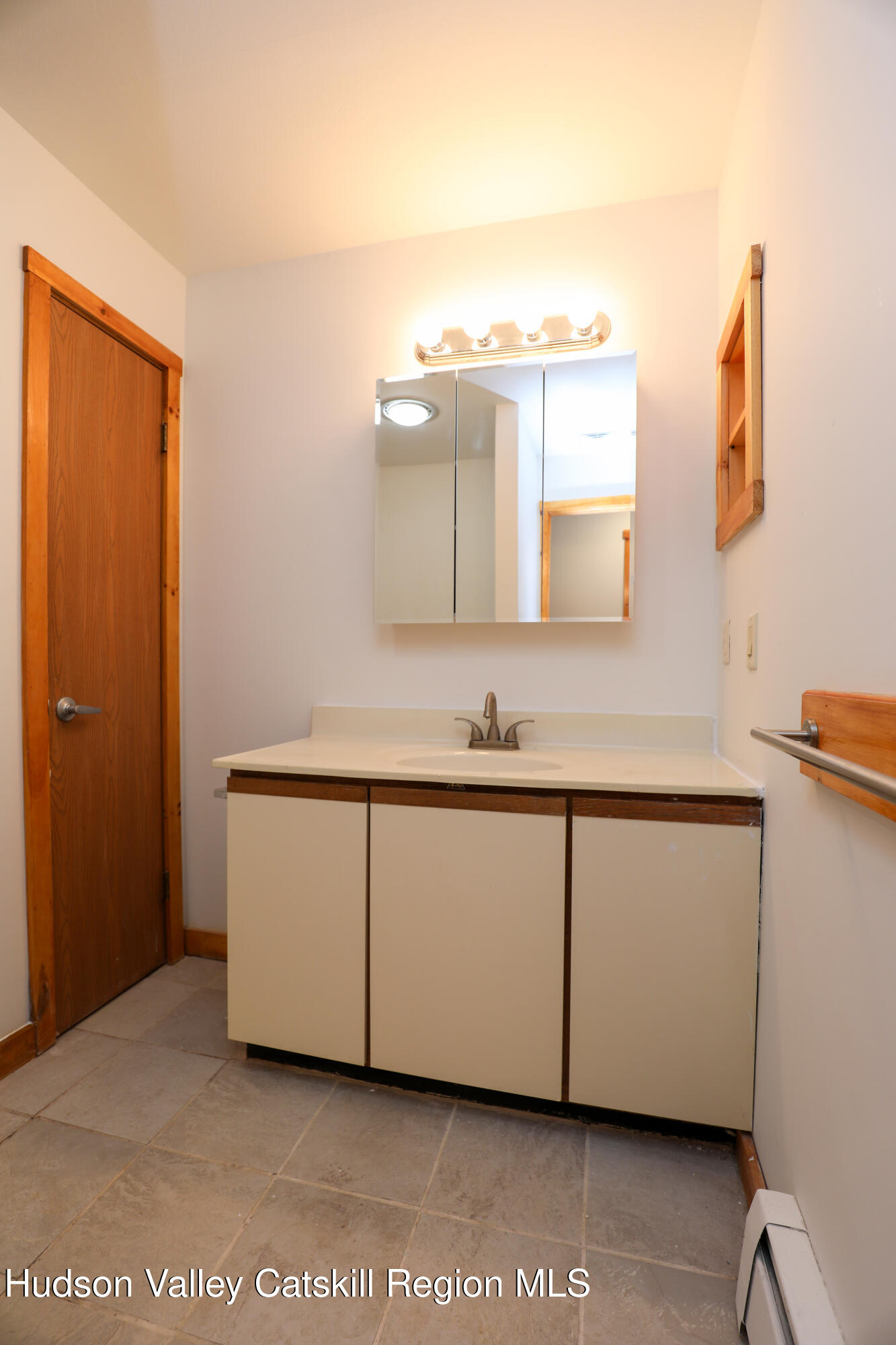 38 Roxanne Boulevard Highland, NY 12528 - Photo 17 of 42 a bathroom with a sink and a mirror
